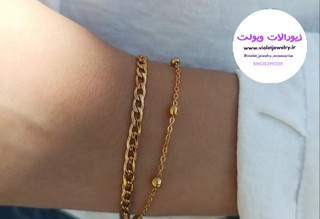 دستبند زنانه دولاین کارتیر و زنجیرتوپی طلایی استیل کد ۱۳۶۶